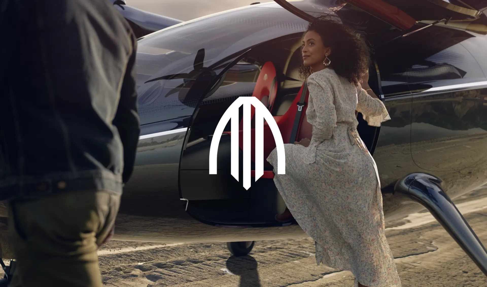 Archer campaign image showing a passenger beside an aircraft