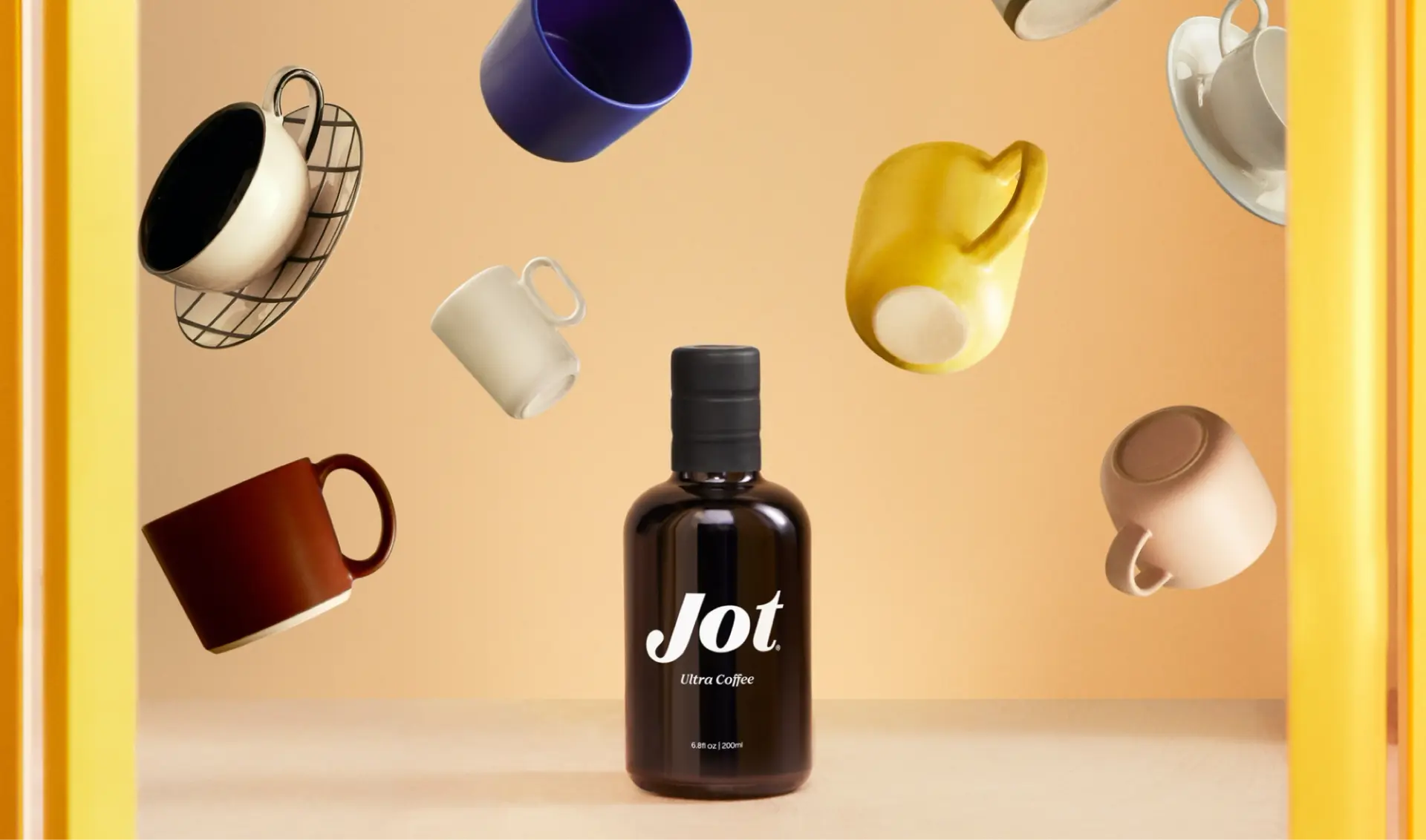 Jot concentrated coffee bottle surrounded by cups in Red Antler campaign imagery